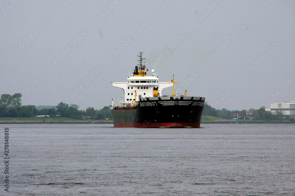 Bremen - Oil tanker on he river Weser, Germany Bremen - Oil tanker on he river Weser, Germany