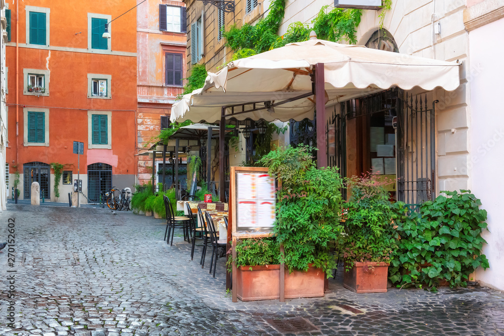 Cozy old street in Trastevere in Rome, Italy. Architecture and landmark of Rome.