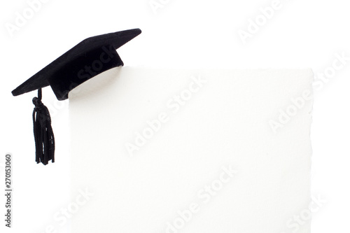 Quadro su tela Black Graduation cap on blank white billboard