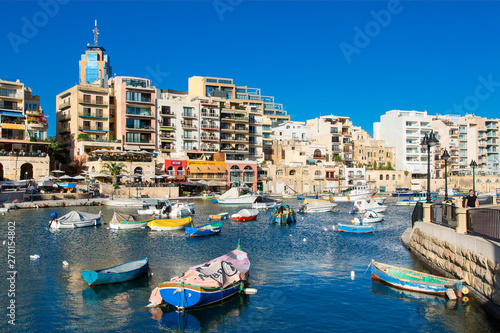 Spinola Bay with restaurants, St. Julian`s, Malta, Mediterranean, Europe photo