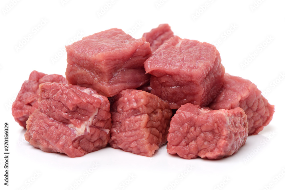 beef cubes with parsley on white background 