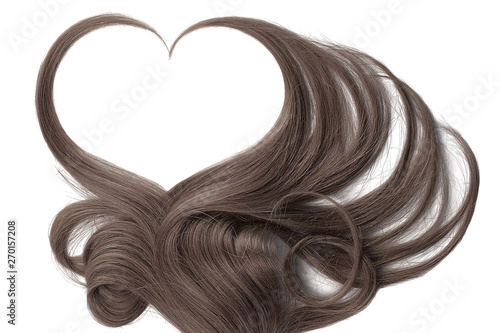 Brown hair in shape of heart  isolated on white background