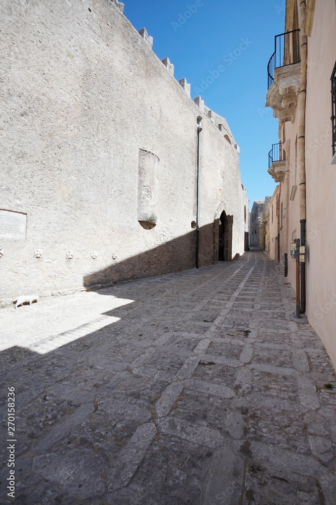 Italian town Erice, alley and bridge in the west Sicily. Old middle ages street in Erice town South of Italy