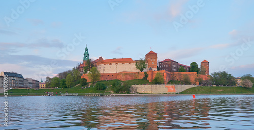 Panoramic view of Wawel castle on a sunset from across the river