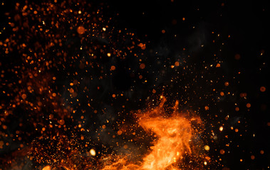 Detail of fire sparks isolated on black background