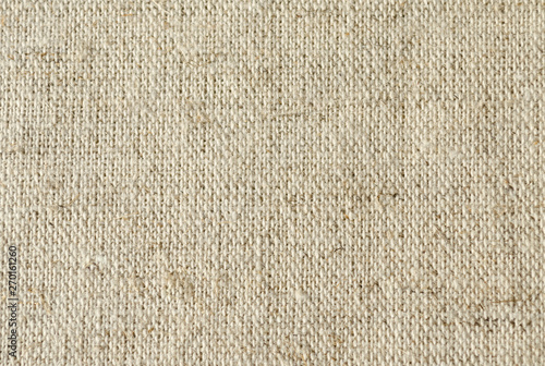 background of coarse linen with a texture of threads and weaves