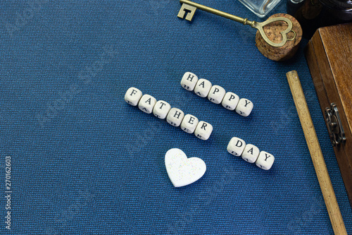 wooden text for father day content close up image.