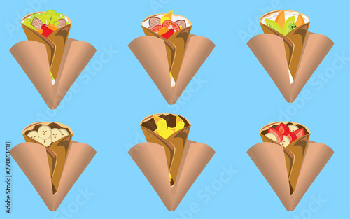crepes and ingredients on the blue background