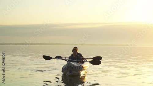 Wallpaper Mural Young couple with kayak during sunset Torontodigital.ca