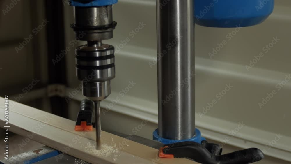 Drilling holes in wooden part for toy Drilling holes in wooden part for toy
