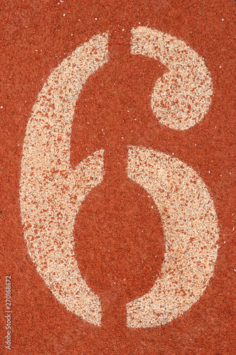 Number 6 on rubber flooring for running athletics, background