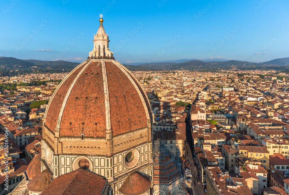 Florence, Tuscany / Italy: Santa Maria del Fiore dome seen from the Campanile at sunset