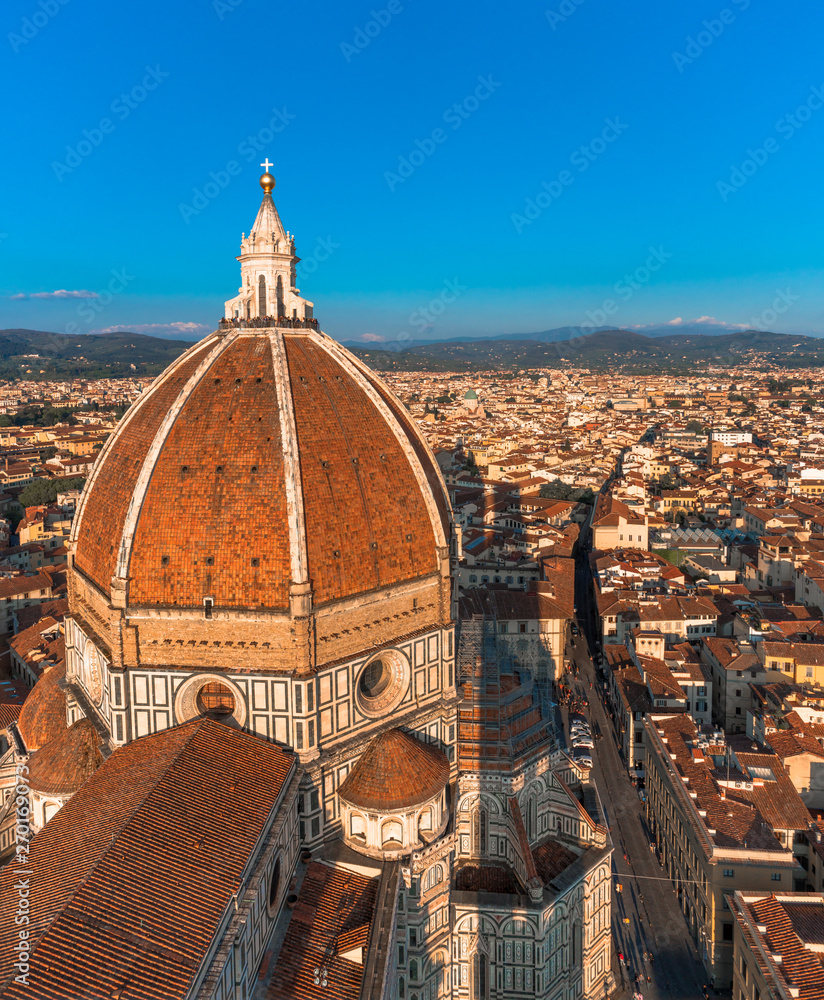 Florence, Tuscany / Italy: Santa Maria del Fiore dome seen from the Campanile at sunset