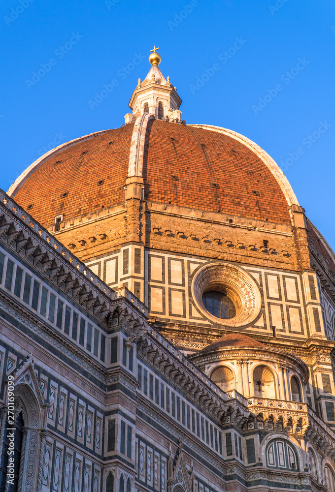 Florence, Tuscany / Italy: Santa Maria del Fiore Dome at sunset seen from Piazza del Duomo