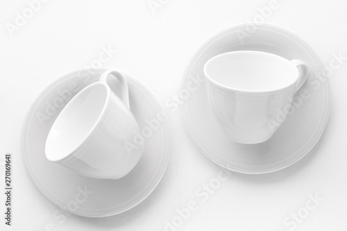 Foto Empty cup and saucer mockup on white background, flatlay