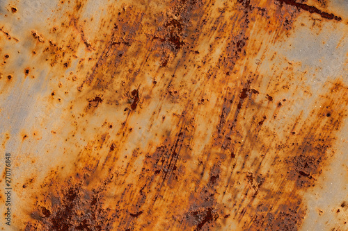 Abstract corroded colorful rusty metal background, rusty metal texture. Peeling paint and rusty old metal