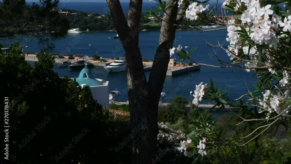 A panoramic view of a Mediterranean sea port on a sunny summer day.