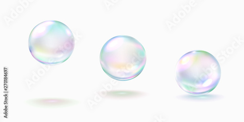 Realistic soap bubble with rainbow colors isolated on white background. Vector water foam elements set. Colorful iridescent glass ball or sphere template.