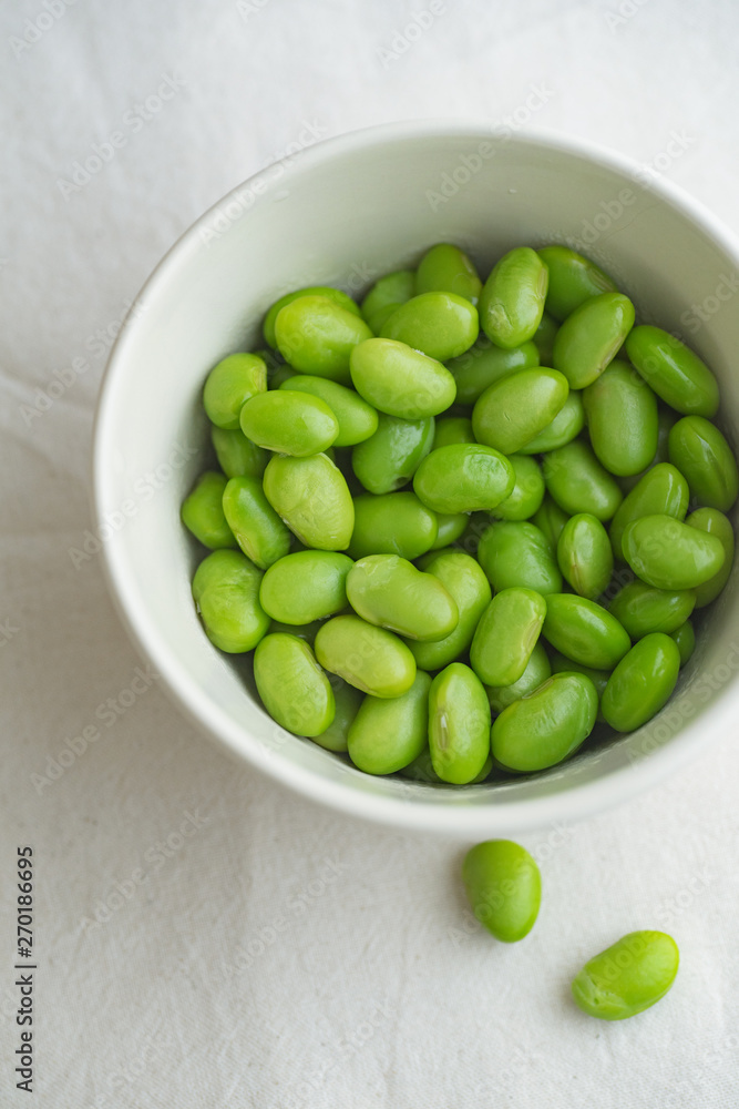 Edamame beans on bowl on a table Edamame beans on bowl on a table