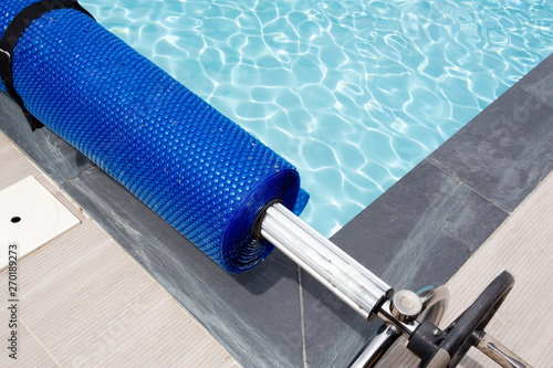 pool cover blue bubble solar equipment to hot water photo