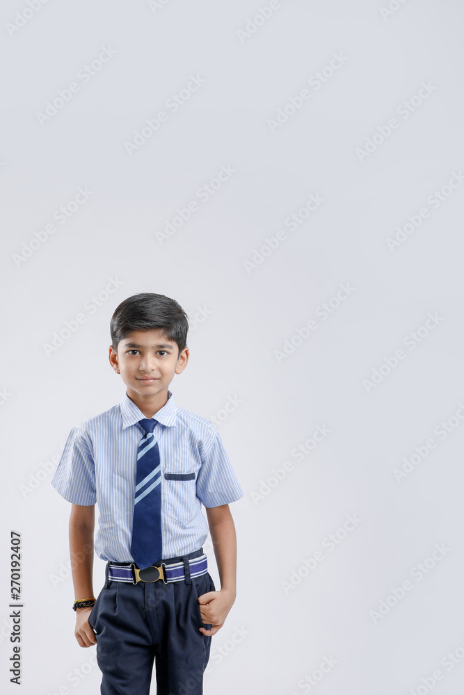 Cute little indian Indian / Asian school boy wearing uniform Stock Photo |  Adobe Stock