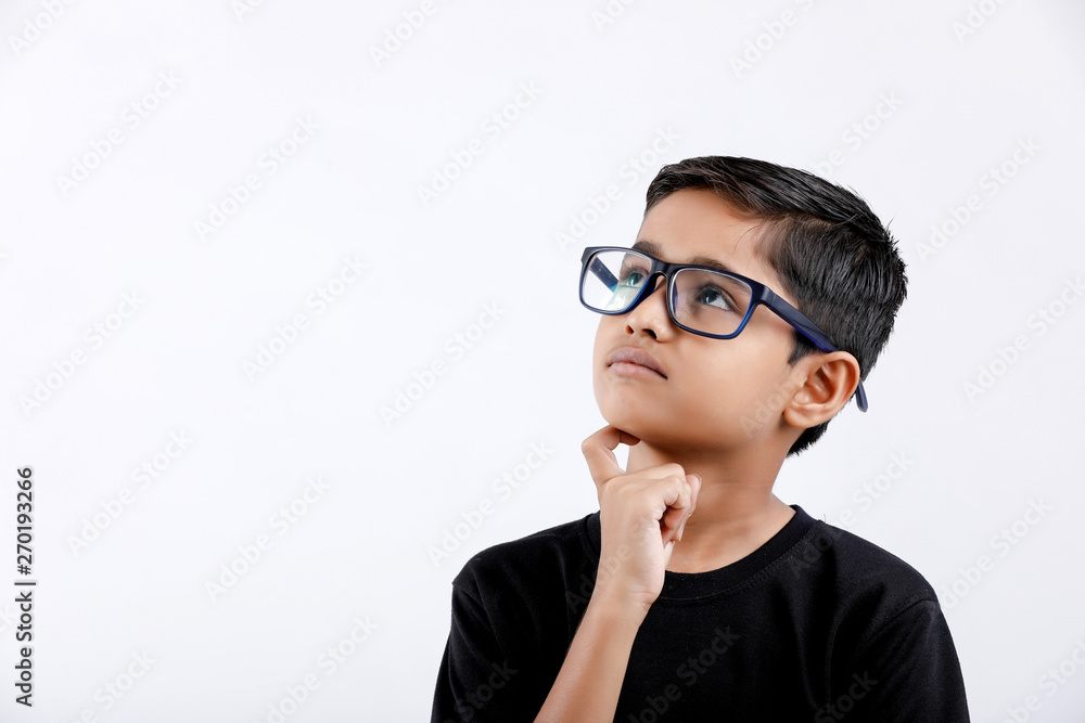 Cute little Indian / Asian boy wearing spectacles