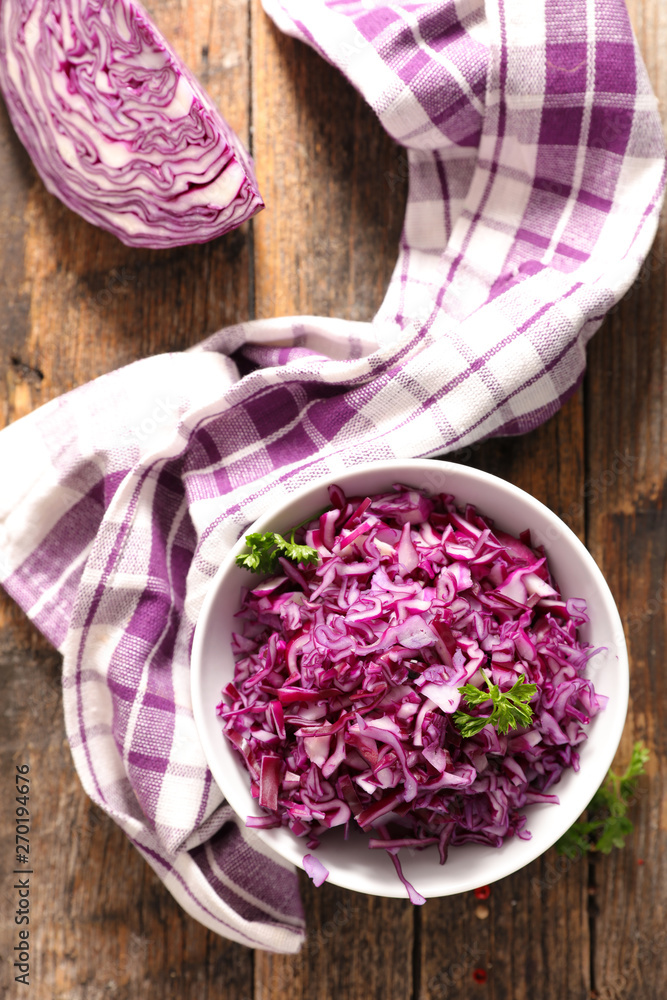 bowl of grated red cabbage bowl of grated red cabbage