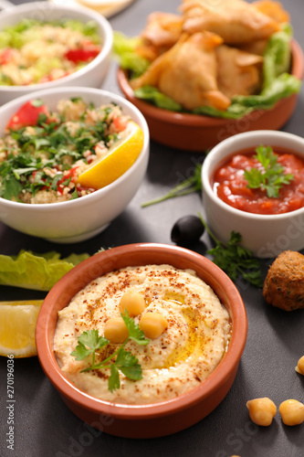 assorted of lebanese food with falafel, hummus,tabouleh,samosa and aubergine caviar