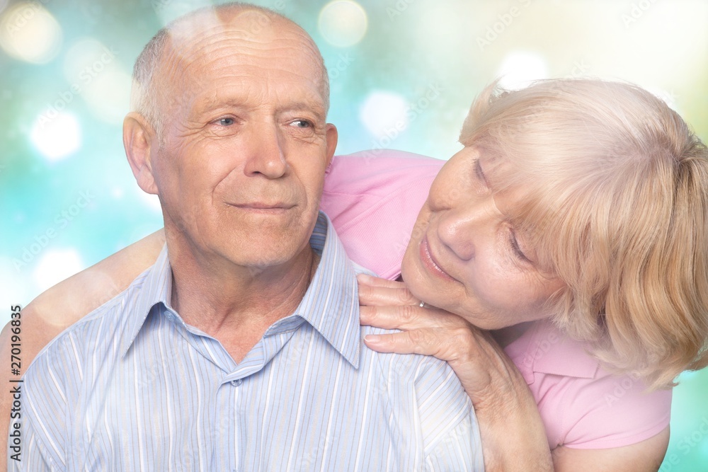 Portrait of happy senior couple smiling at home Portrait of happy senior couple smiling at home