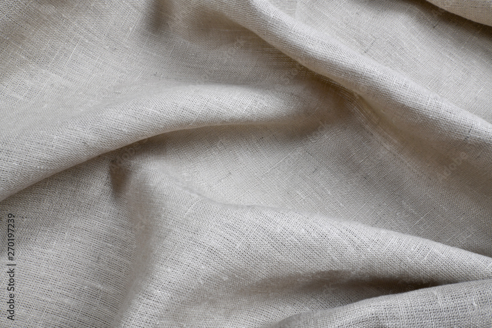 Beige canvas fabric texture. Woven fabric pattern, background and texture. Beige canvas fabric texture. Woven fabric pattern, background and texture.