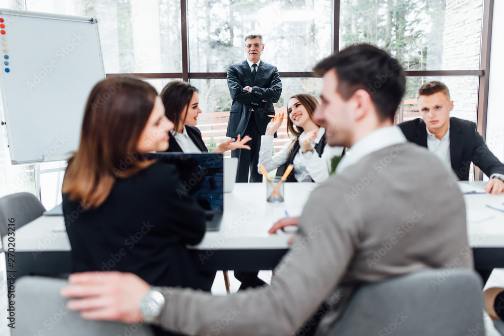 Successful businesswoman hand to ask question at team training, boss listening a proposition.. Successful businesswoman hand to ask question at team training, boss listening a proposition..