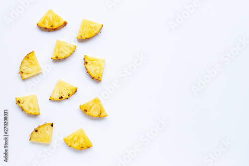 Pineapple slices on white.