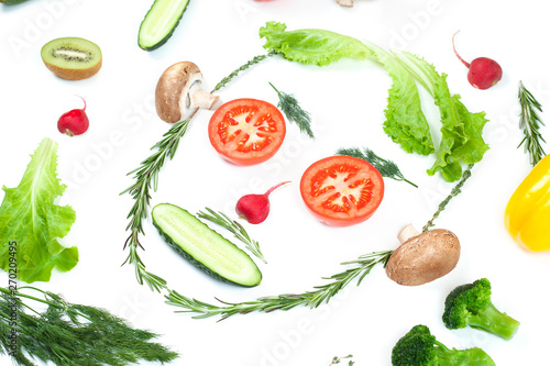 Fototapeta Naklejka Na Ścianę i Meble -  Funny face from different vegetables tomatoes, cucumber, radish, dill and rosemary isolated on white background. Healthy eating and vegan food concept. Kitchen