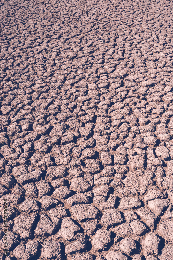 Cracked earth, desertification process,abstract background Cracked earth, desertification process,abstract background