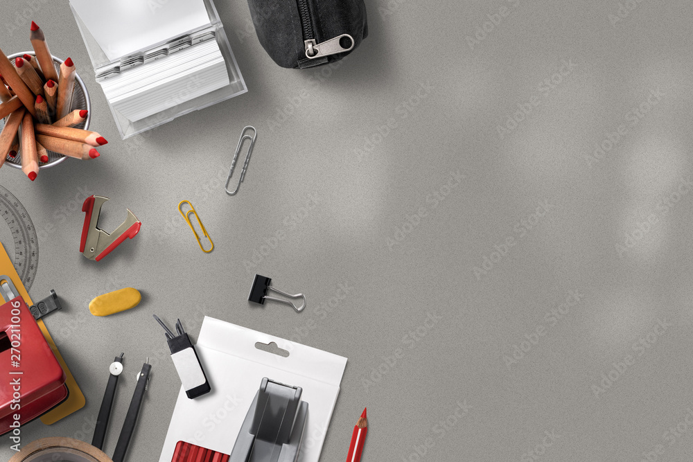 stationery and office items on grey background