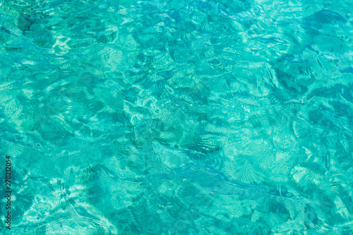 aquamarine water ripple blurred bright wallpaper background, copy space