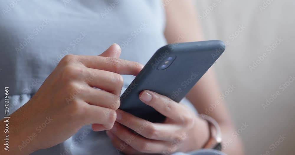 Woman use of mobile phone at home Woman use of mobile phone at home