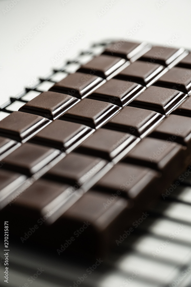 Chocolate tablet on oven grill