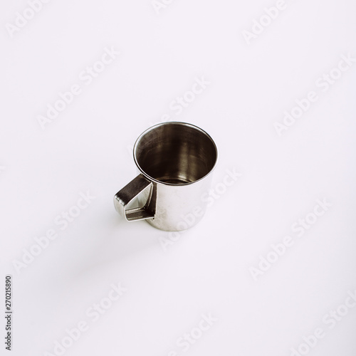 metal mug on a white background, copy space