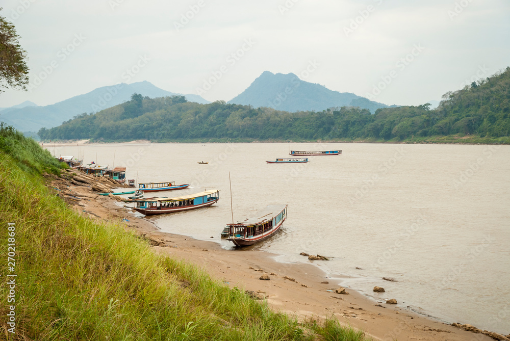 Long boat on Mekong river, Laos