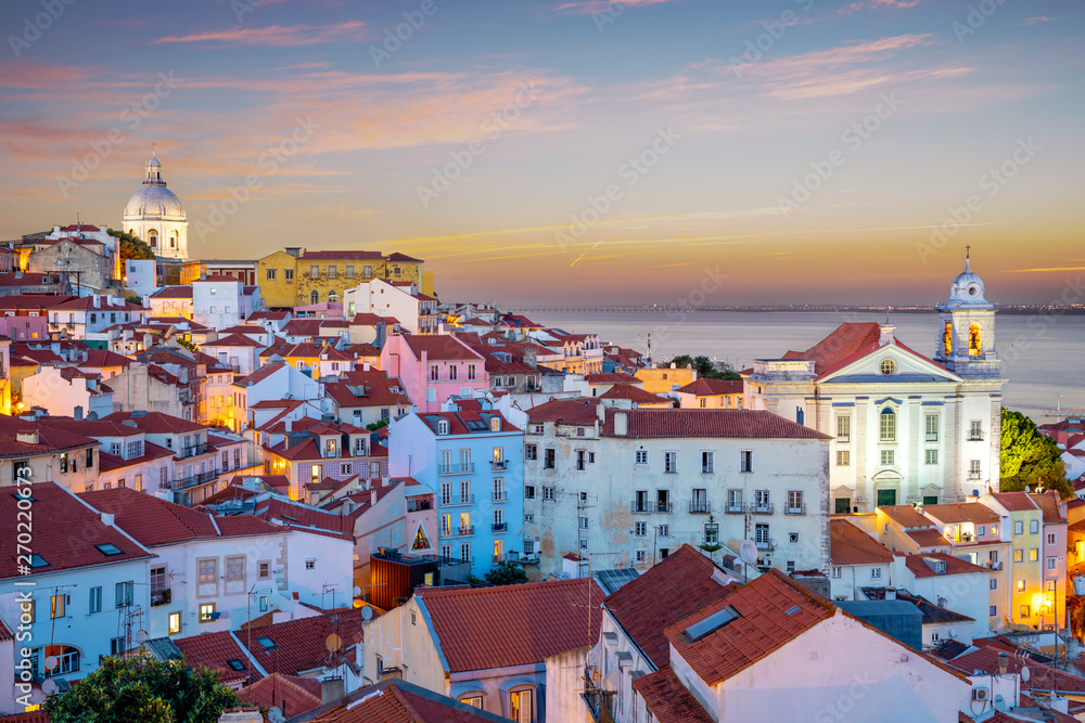 skyline of alfama at lisbon, portugal at dawn
