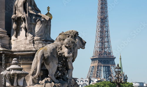 Statue 'La France de Charlemagne' by Alfred Lenoir at the Pont Alexandre III with Eiffel Tower, Paris, France photo