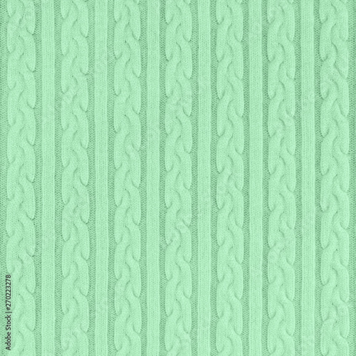 Trendy mint colored Knitwear Fabric Texture with Pigtails and stripes. Repeating Machine Knitting Texture of Sweater. Knitted Background. Color of the year 2020