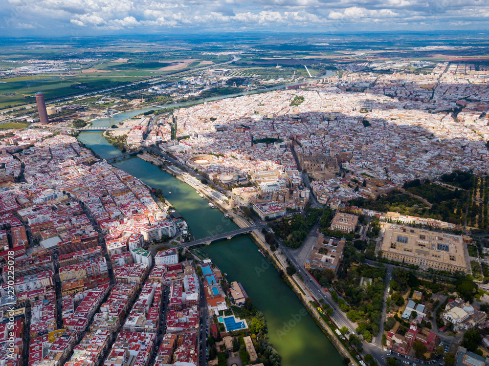 Aerial view Sevilla of city center with embankment of Guadalquivir. Spain