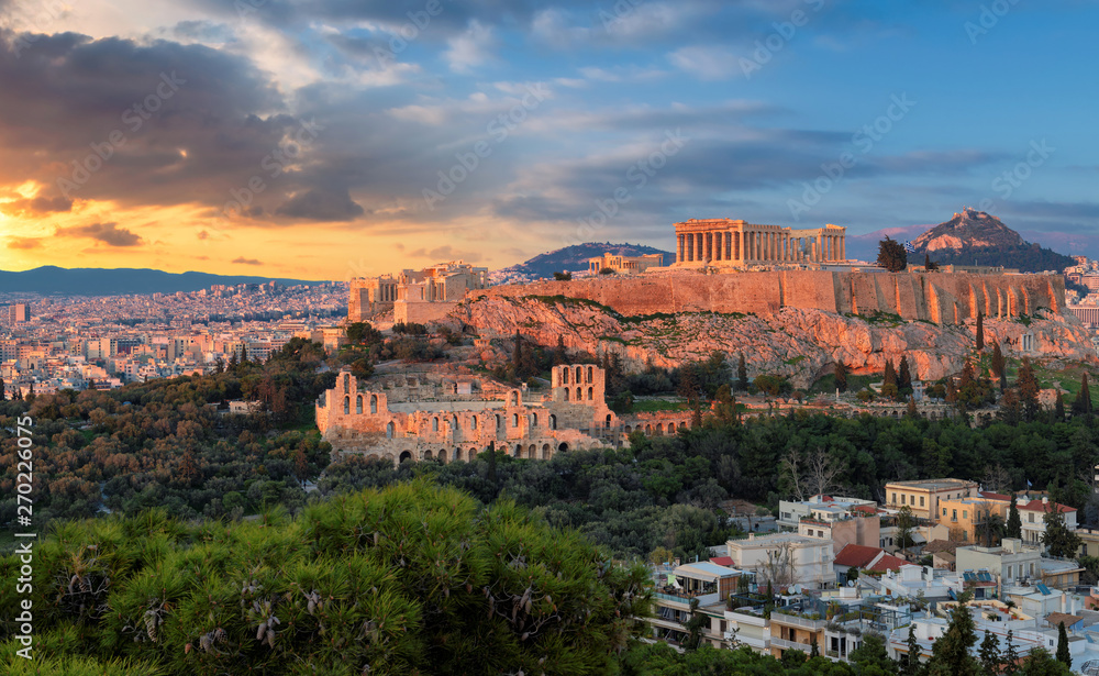 The Acropolis of Athens, Greece, with the Parthenon Temple on Acropolis hill during a sunset