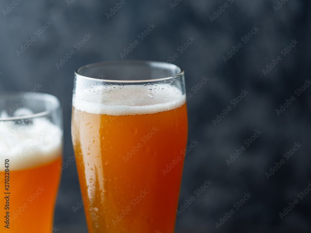 Two glasses of craft wheat beer Two glasses of craft wheat beer