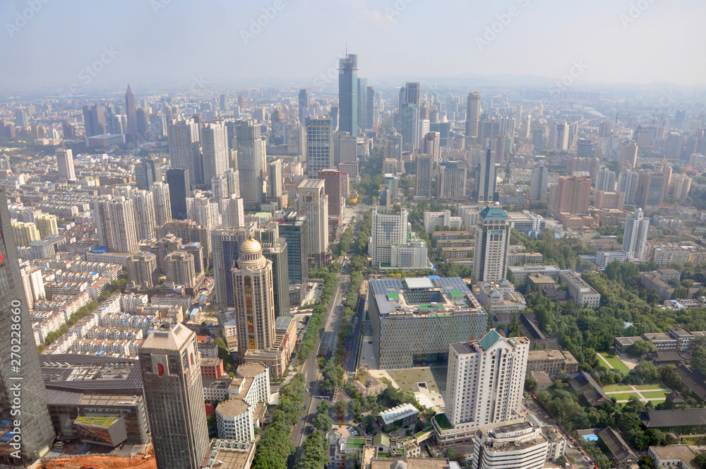 Fototapeta premium Aerial view of Nanjing Modern City Skyline Xinjiekou (South), viewed from Zifeng Tower in Gulou, Nanjing, Jiangsu Province, China.