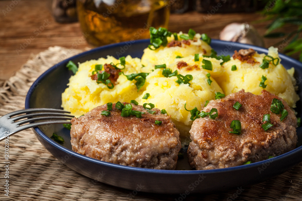 Meatballs served with boiled potatoes. Meatballs served with boiled potatoes.