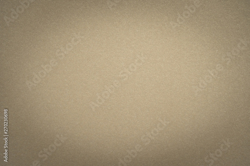 Abstract beige glossy paper texture background or backdrop. Empty light brown cardboard or shiny paperboard for decorative design element. Simple grainy surface for journal template presentation