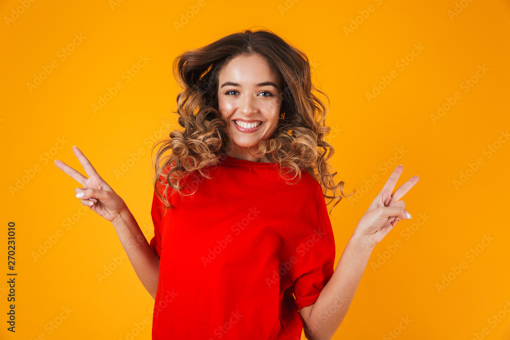 Portrait of a lovely cheerful young woman standing Portrait of a lovely cheerful young woman standing